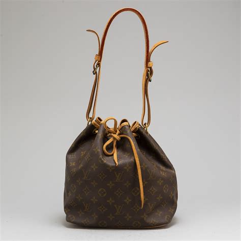 louis vuitton vintage monogram petit noe|louis vuitton noe pouch.